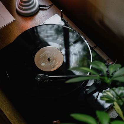 A vinyl record spinning on a turntable